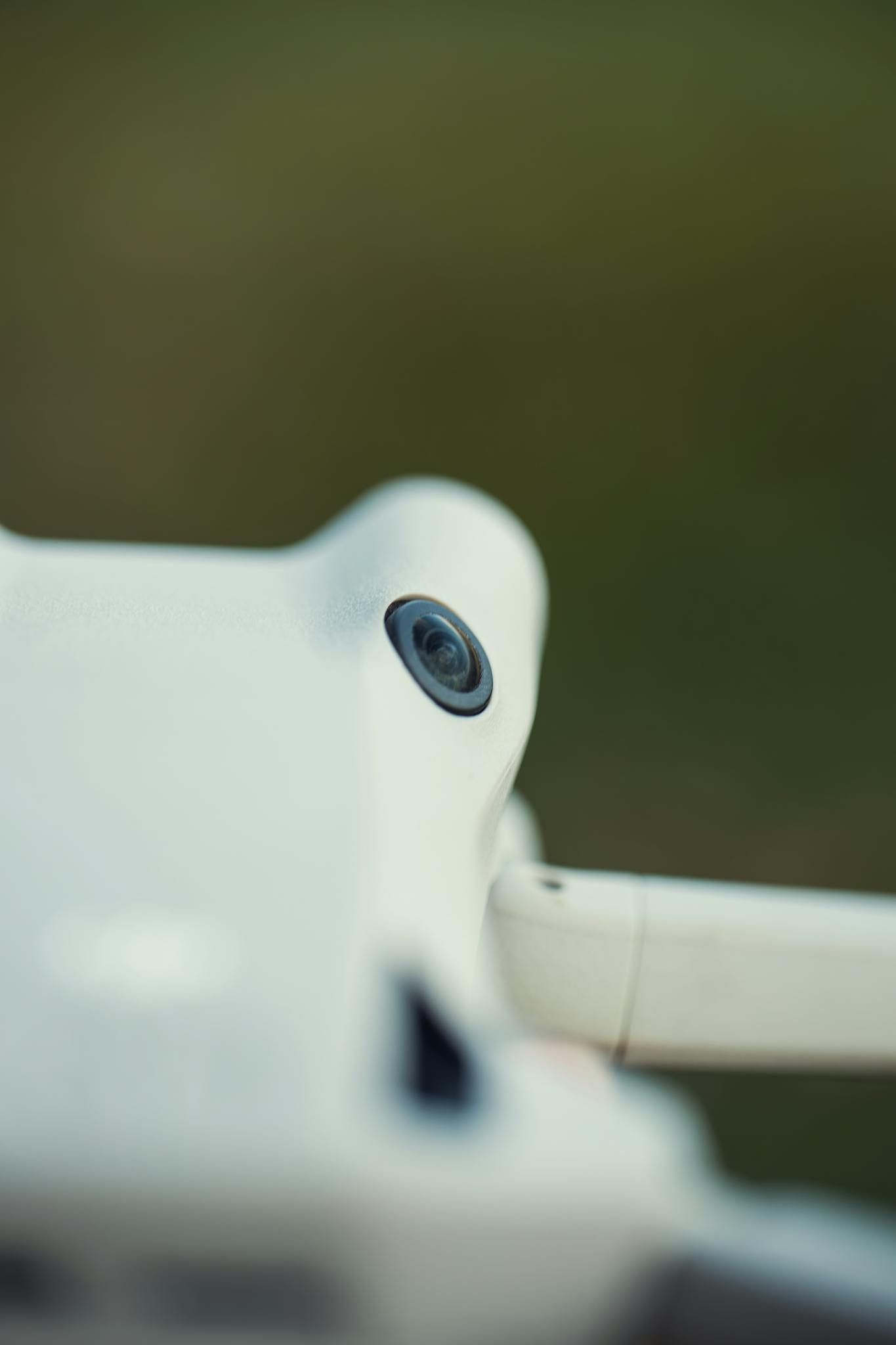 Detailed close-up of a drone's camera lens. Ideal for technology and innovation themes.